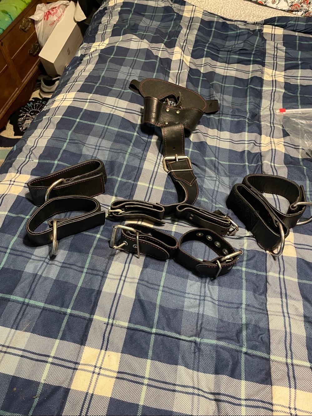 multi use restraints with red stitching